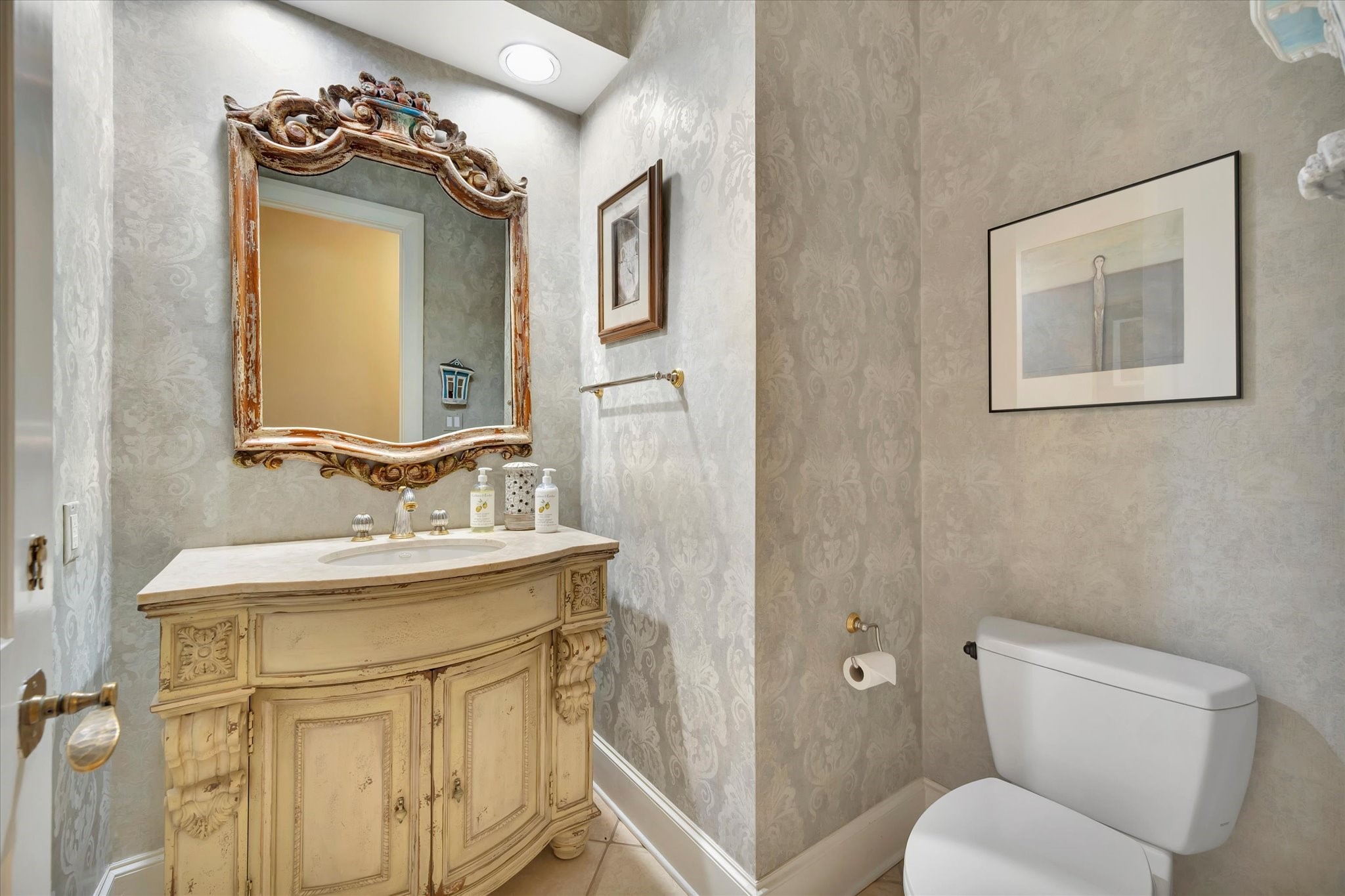 14214 Golf View Trail Houston, TX 77059 - Photo 41 of 49 a bathroom with a toilet sink and mirror