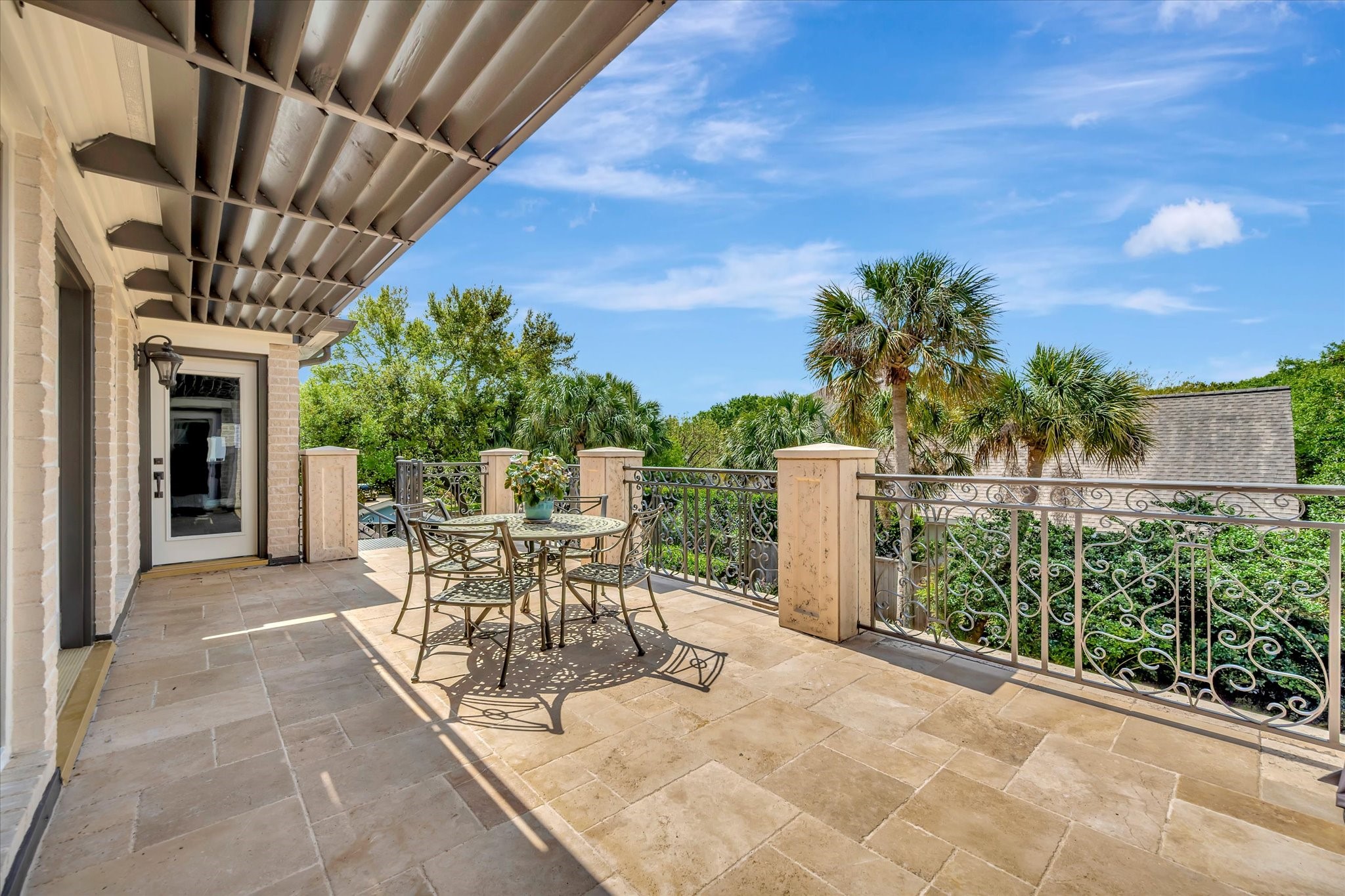 14214 Golf View Trail Houston, TX 77059 - Photo 47 of 49 a view of a patio with a table and chairs and potted plants