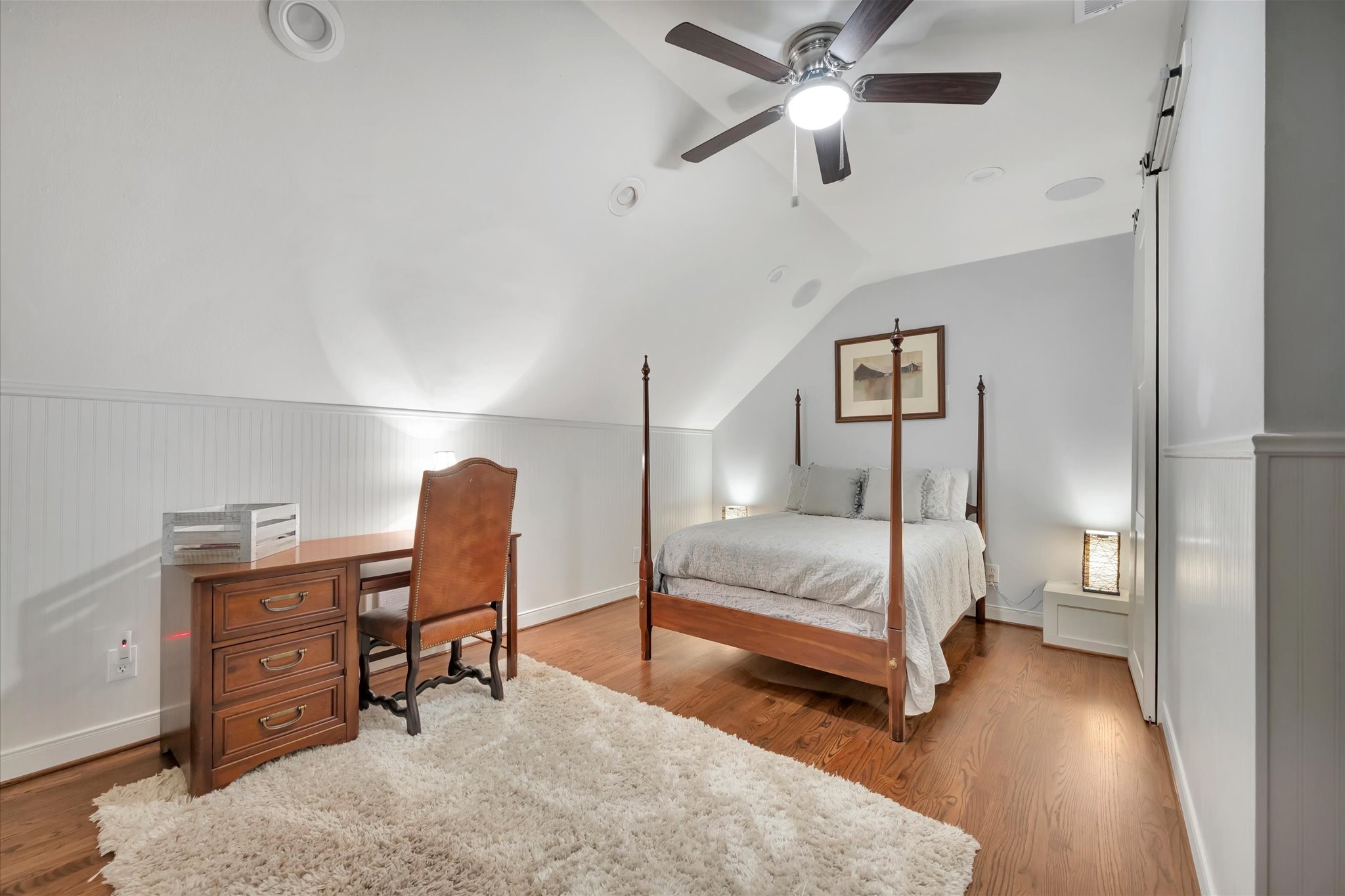 14214 Golf View Trail Houston, TX 77059 - Photo 49 of 49 a bedroom with a bed and a chandelier