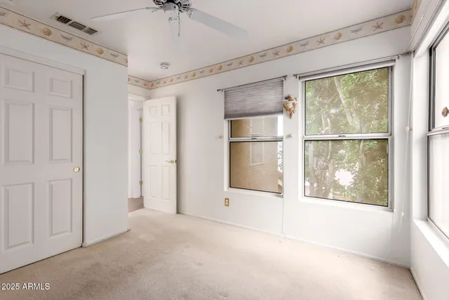 a view of empty room with a window