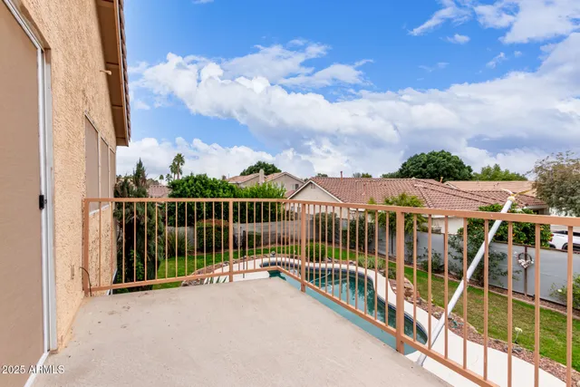 a view of a house with a yard and plants