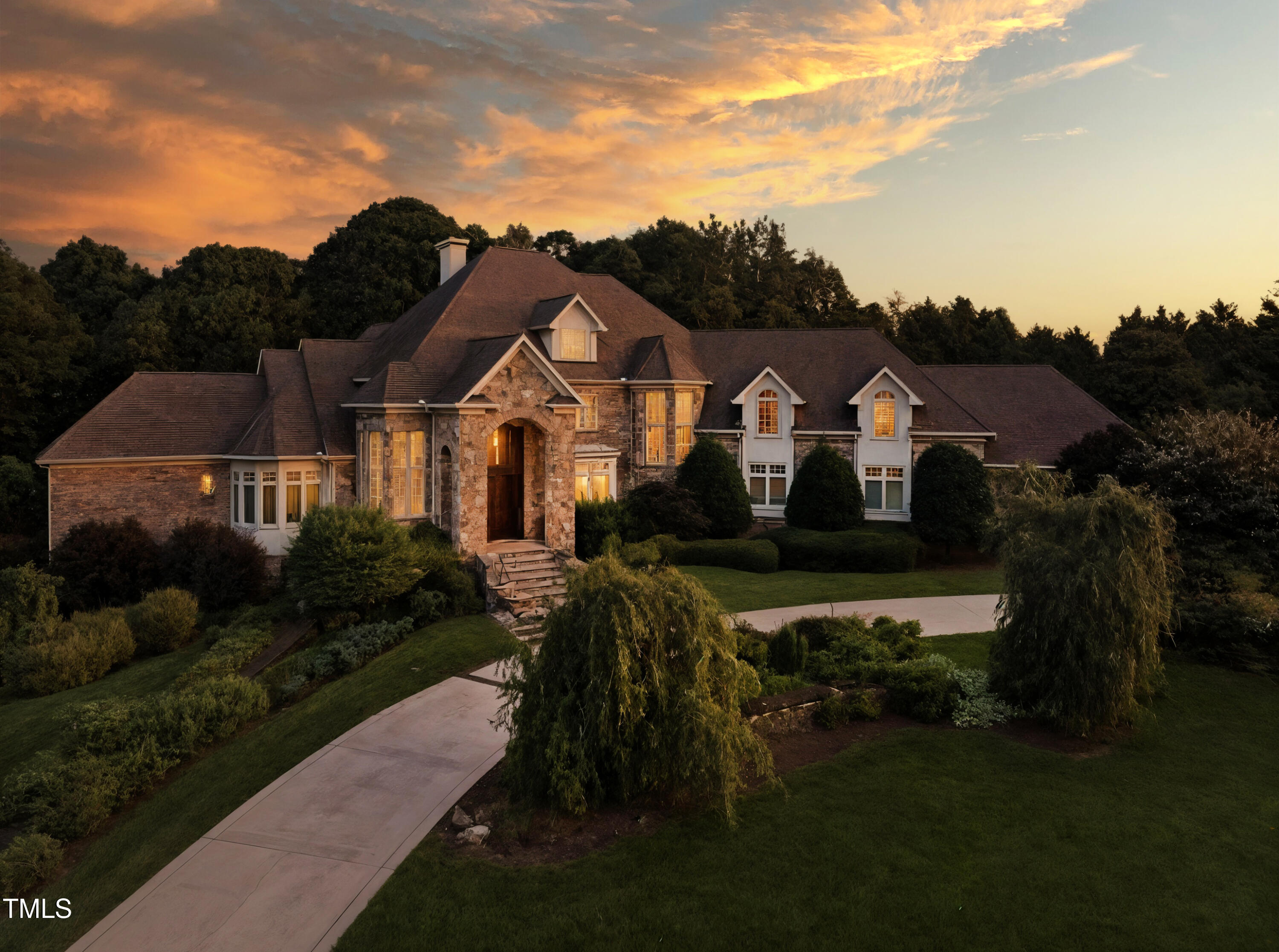 308 Swans Mill Crossing Raleigh, NC 27614 - Photo 1 of 100 1-web-or-mls-DJI_0571_twilight_8d222dda-