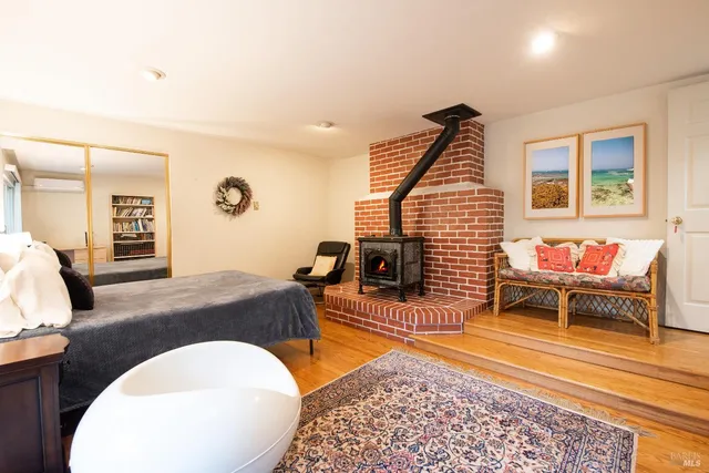 a living room with furniture and a rug