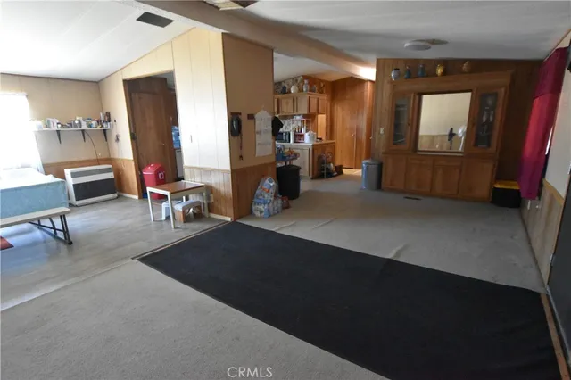 a kitchen with sink cabinets and window