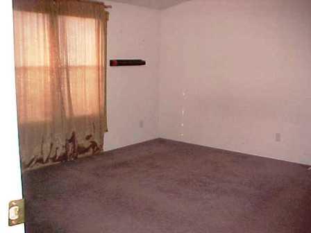 14741 Douglas Road Yakima, WA 98908 - Photo 3 of 18 an empty room with windows