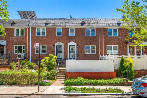 a front view of a multi story residential apartment building
