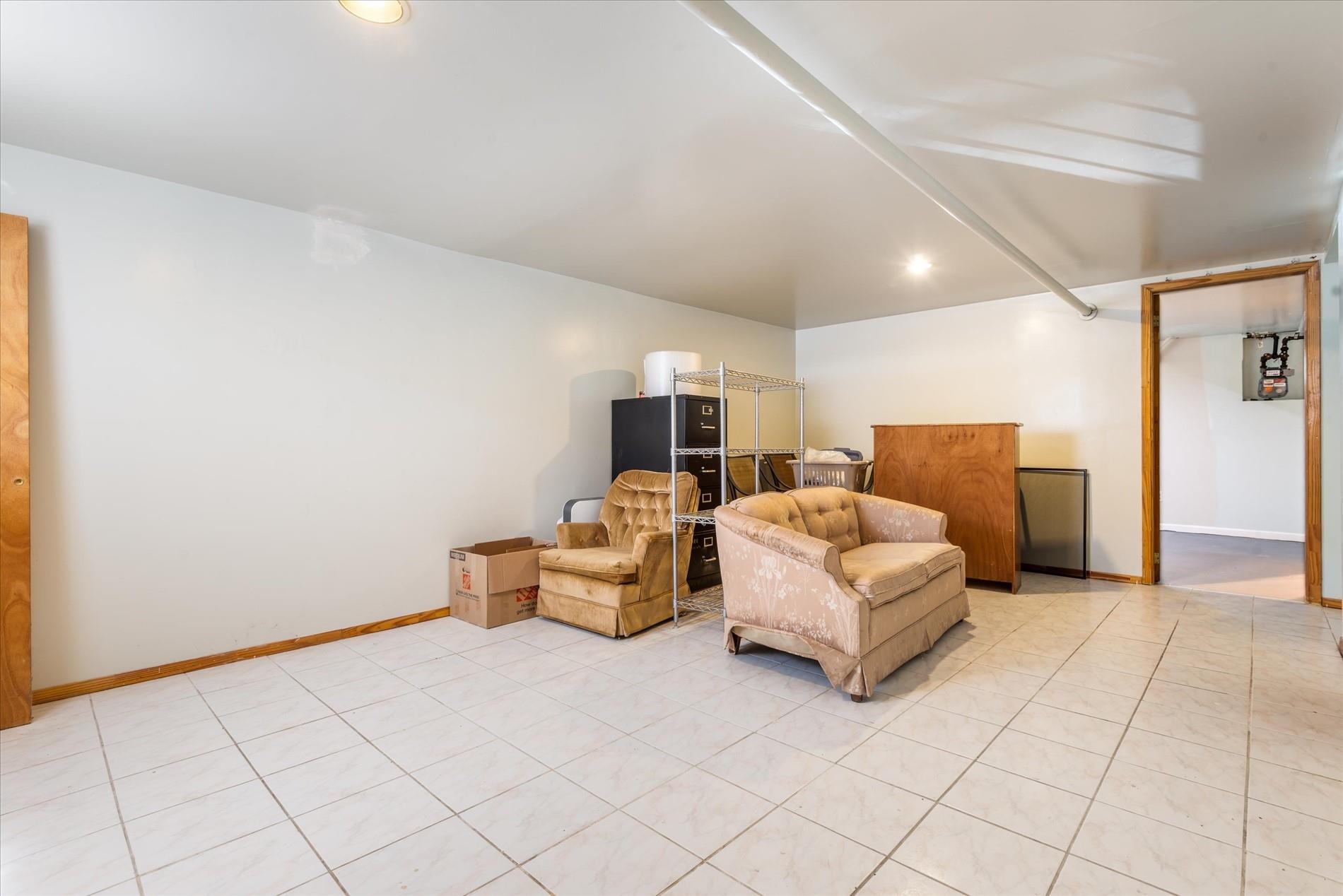 150-20 77th Avenue Queens, NY 11367 - Photo 18 of 24 a living room with furniture