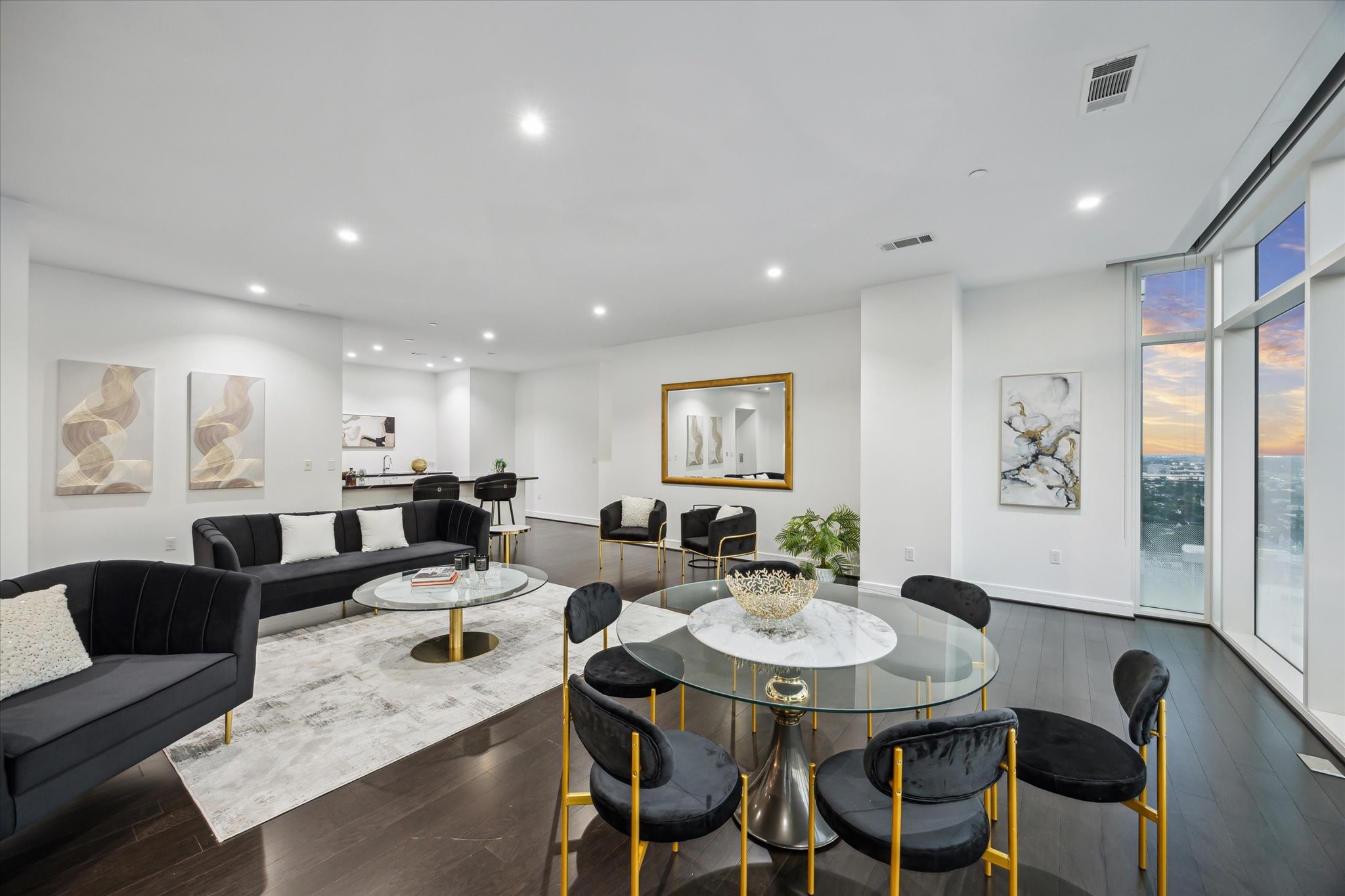 4521 San Felipe Street, Unit 23045 Houston, TX 77027 - Photo 2 of 25 View of family room with wet bar in the back round.