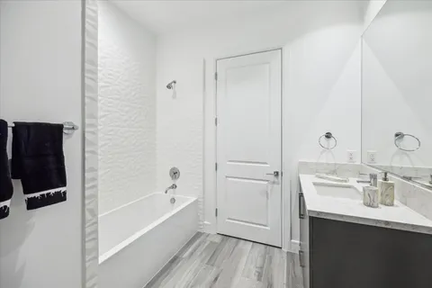 a balcony with chairs and table