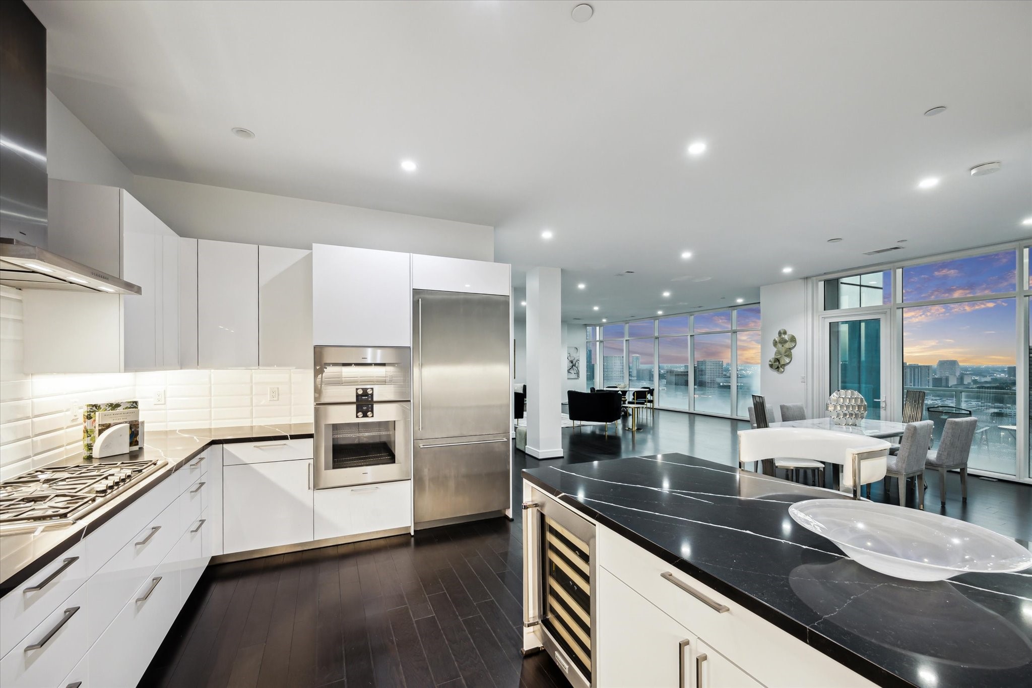 4521 San Felipe Street, Unit 23045 Houston, TX 77027 - Photo 25 of 25 Never miss a conversation while in the kitchen because you are not in the same room. The open floor plan makes it possible to enjoy your company while cooking or cleaning. Note the views you have to cook with.