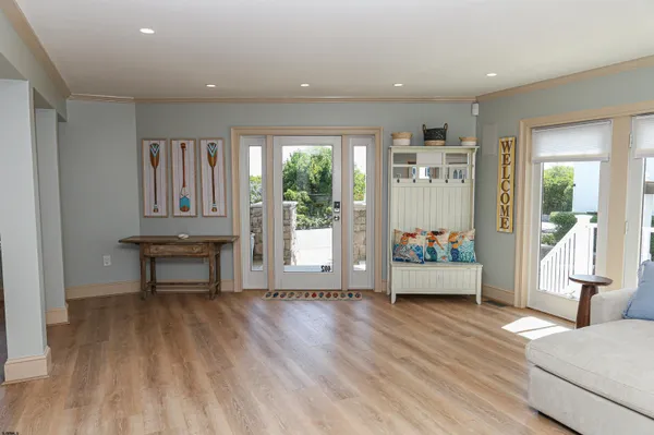 a living room with furniture and a table
