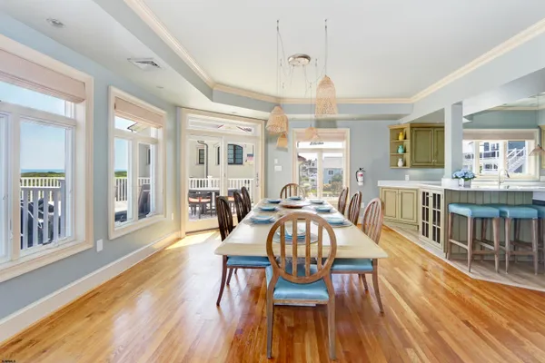a view of a kitchen and dining room