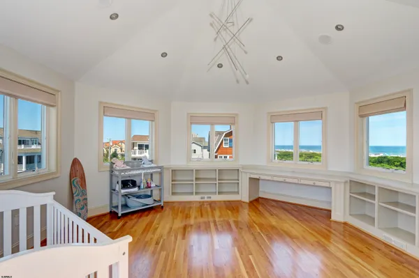 a view of a patio with a table and chairs