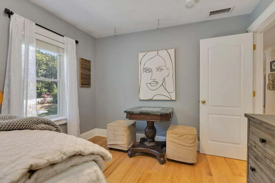 848 Cedar Street West Barnstable, MA 02668 - Photo 25 of 51 a bedroom with a bed and a window
