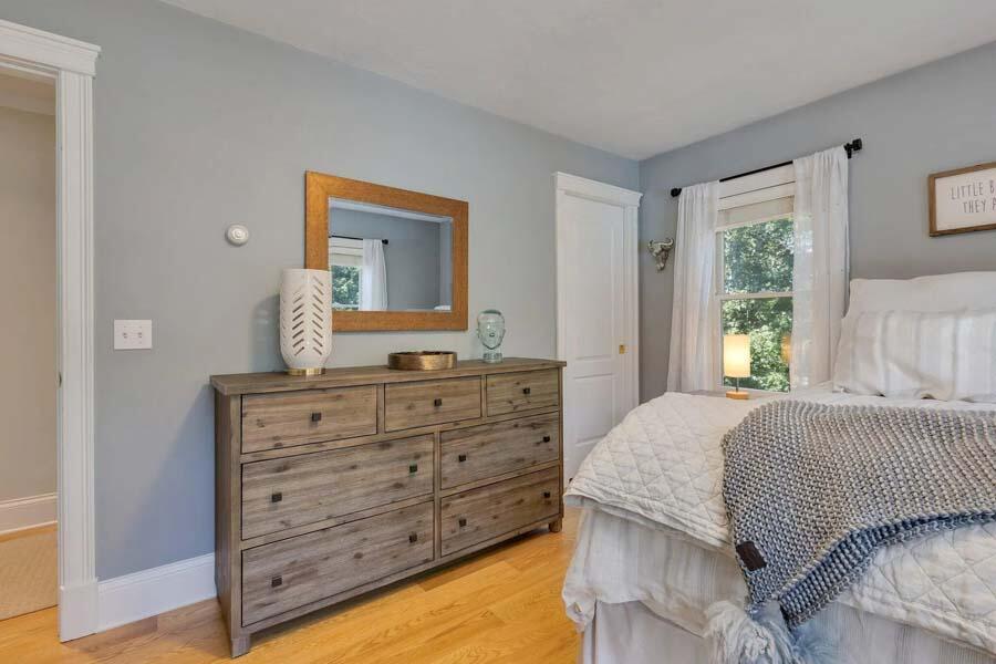 848 Cedar Street West Barnstable, MA 02668 - Photo 26 of 51 a bedroom with a bed and a dresser