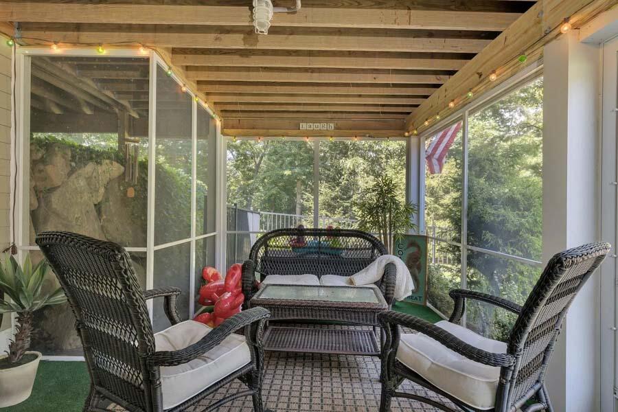 848 Cedar Street West Barnstable, MA 02668 - Photo 34 of 51 a view of a patio with couches chairs and a potted plant