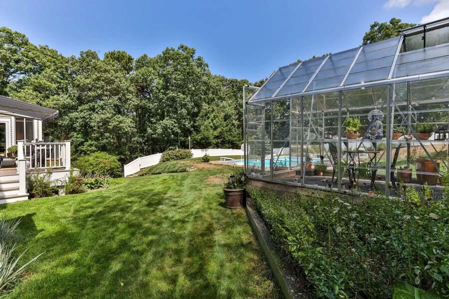 848 Cedar Street West Barnstable, MA 02668 - Photo 38 of 51 a view of a house with backyard and sitting area