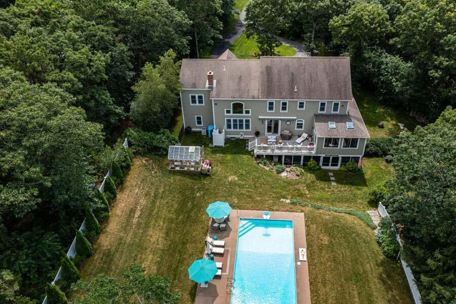 848 Cedar Street West Barnstable, MA 02668 - Photo 43 of 51 an aerial view of a house with swimming pool big yard and large trees