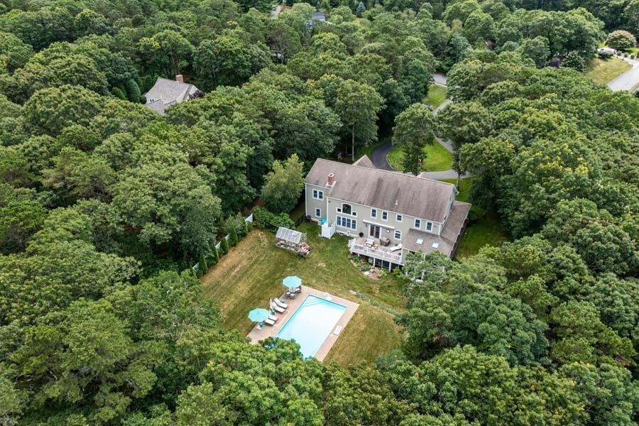 848 Cedar Street West Barnstable, MA 02668 - Photo 45 of 51 an aerial view of a house with a yard