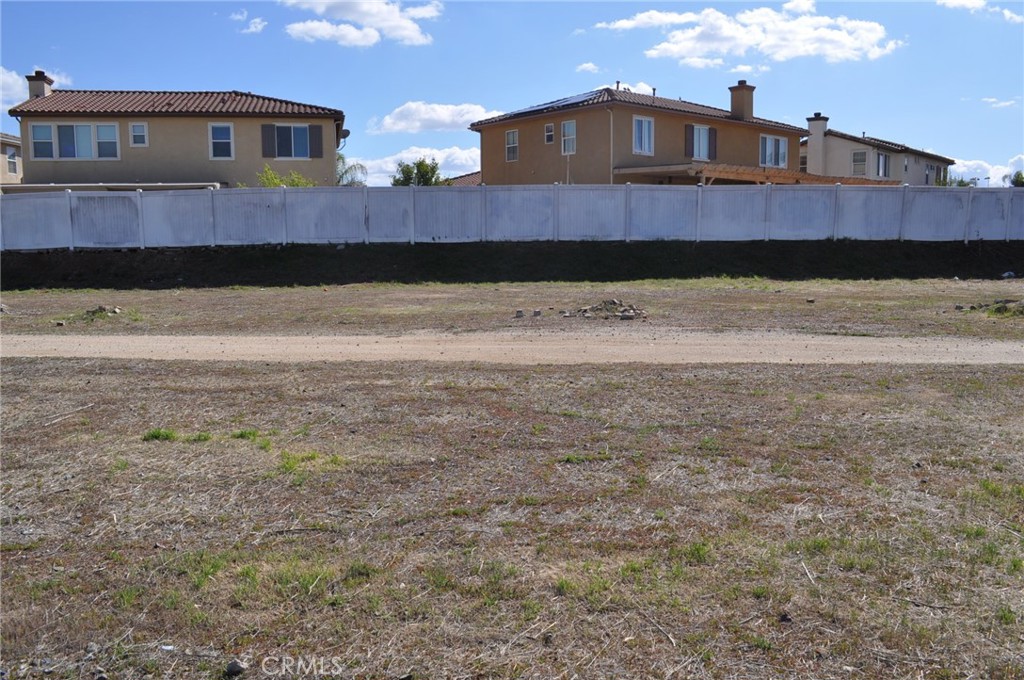 0 Dale Perris Ca Perris, CA 92571 - Photo 1 of 7 a front view of a house with a yard