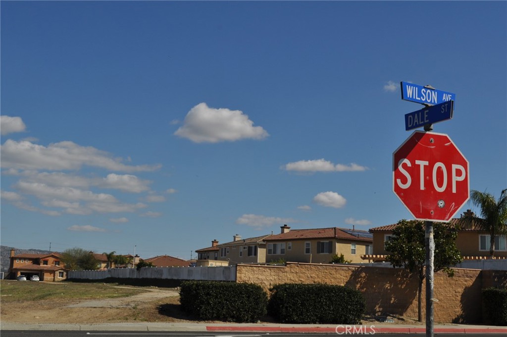 0 Dale Perris Ca Perris, CA 92571 - Photo 2 of 7 a front view of a building with sign board