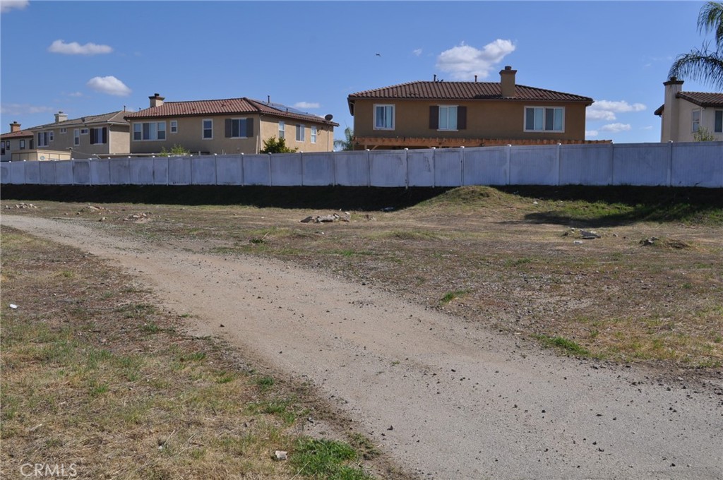 0 Dale Perris Ca Perris, CA 92571 - Photo 3 of 7 a front view of a house with a yard