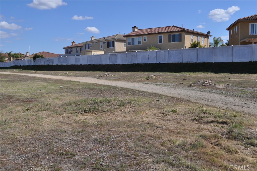 0 Dale Perris Ca Perris, CA 92571 - Photo 4 of 7 a front view of a house with a yard