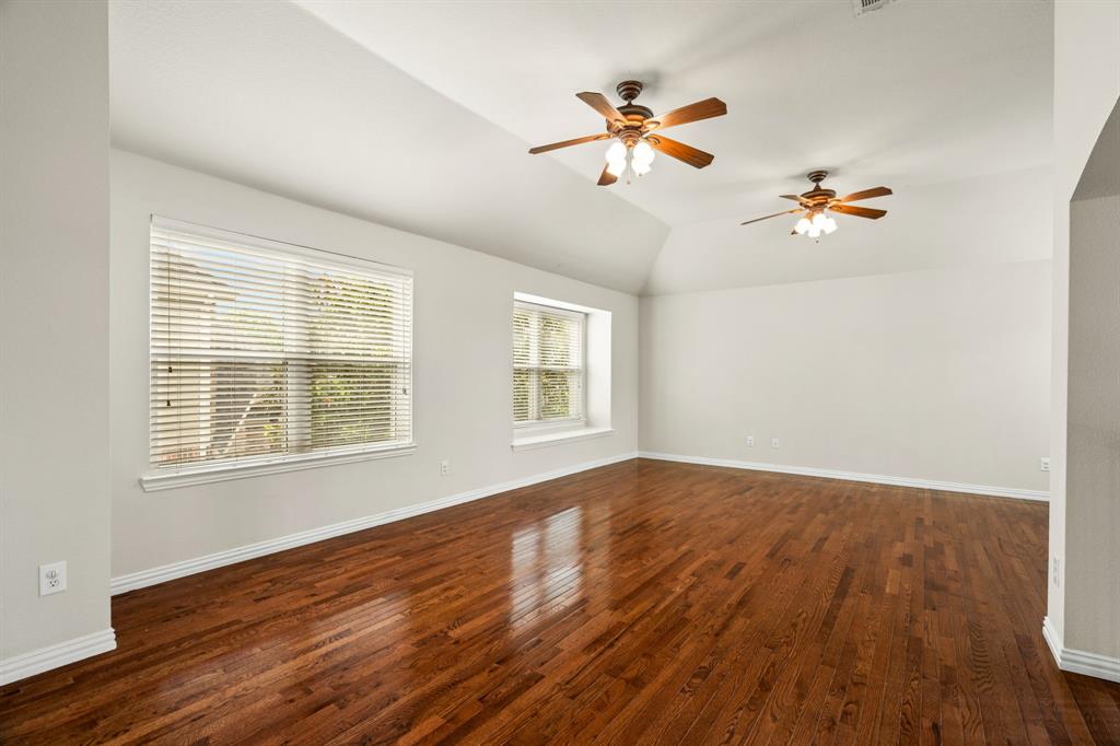 2012 Burnside Drive Allen, TX 75013 - Photo 29 of 40 a view of an empty room with a window and wooden floor