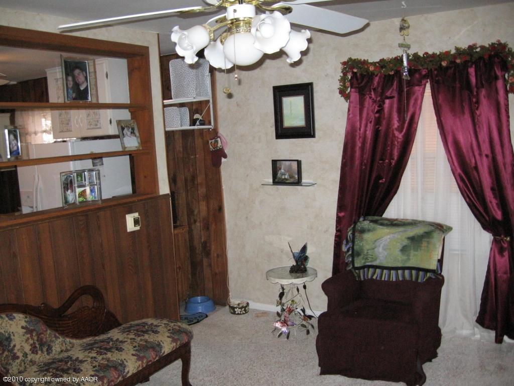 4620 South Hayden Street Amarillo, TX 79110 - Photo 6 of 12 a view of a bedroom with a baby crib