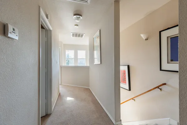 a view of a hallway with entryway