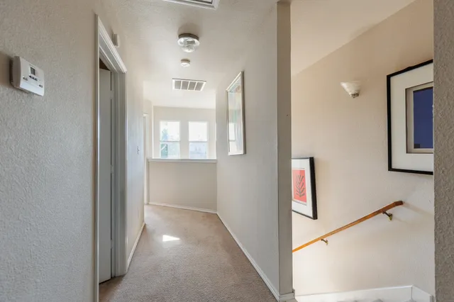 a view of a hallway with entryway