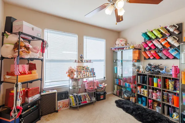 a bedroom with lots of baby toys
