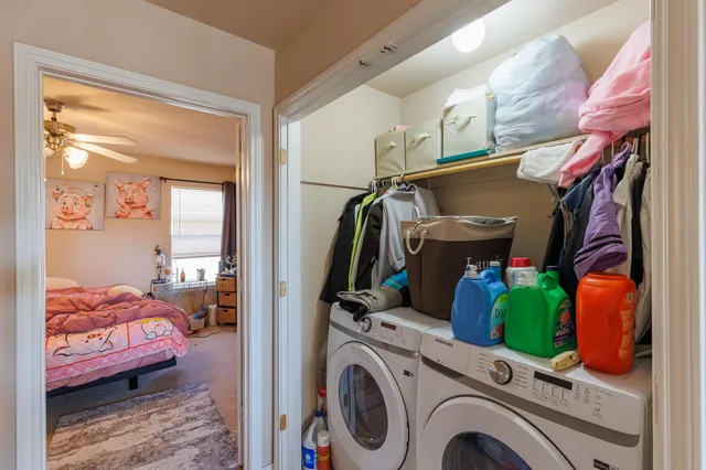 a utility room with dryer and washer