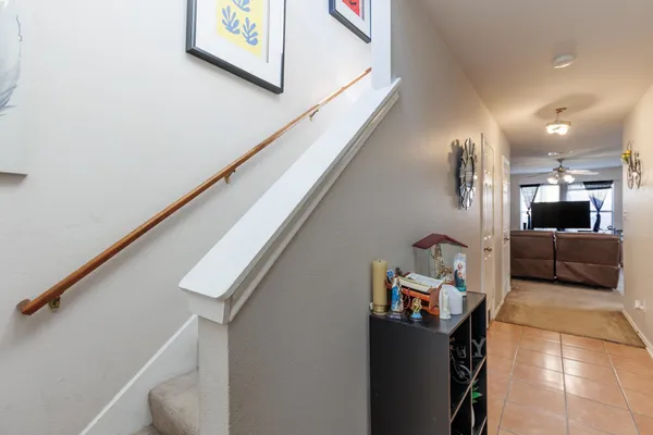 a view of living room with furniture and a large window