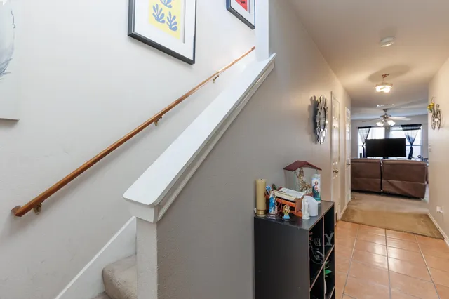 a view of living room with furniture and a large window