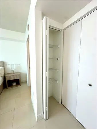 a view of a bathroom and a shower
