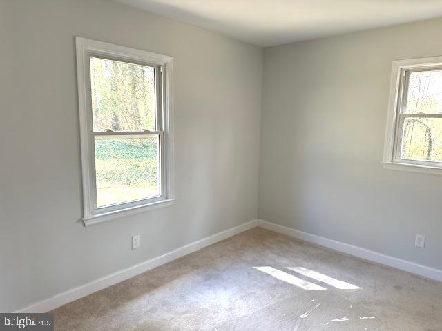 26022 Zion Road Ruther Glen, VA 22546 - Photo 15 of 21 an empty room with a window