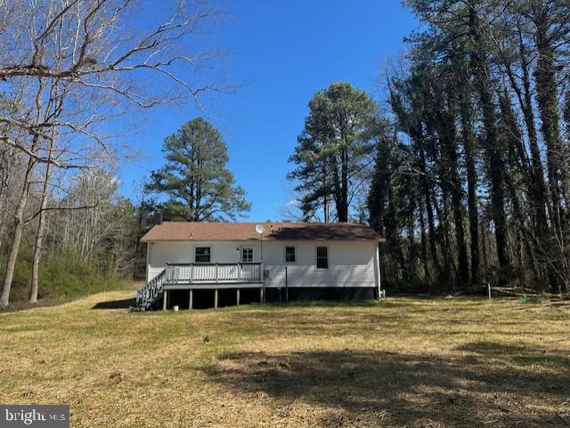 26022 Zion Road Ruther Glen, VA 22546 - Photo 21 of 21 a view of a house with a swimming pool