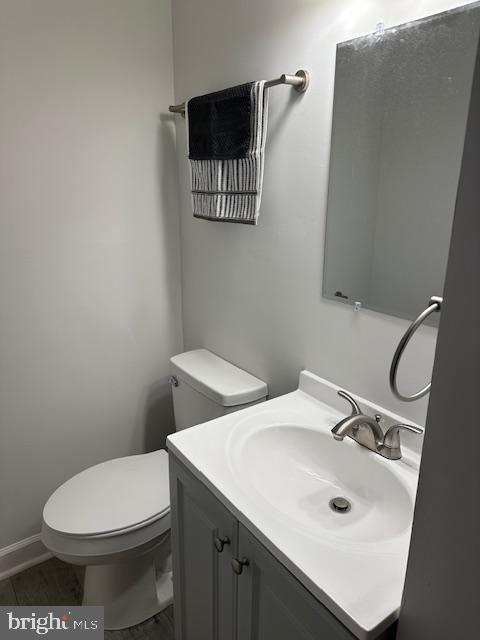 26022 Zion Road Ruther Glen, VA 22546 - Photo 10 of 21 a bathroom with a sink toilet and mirror