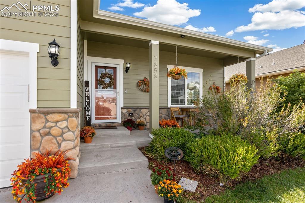 7858 Chasewood Loop Colorado Springs, CO 80908 - Photo 4 of 40 a view of a porch with seating space