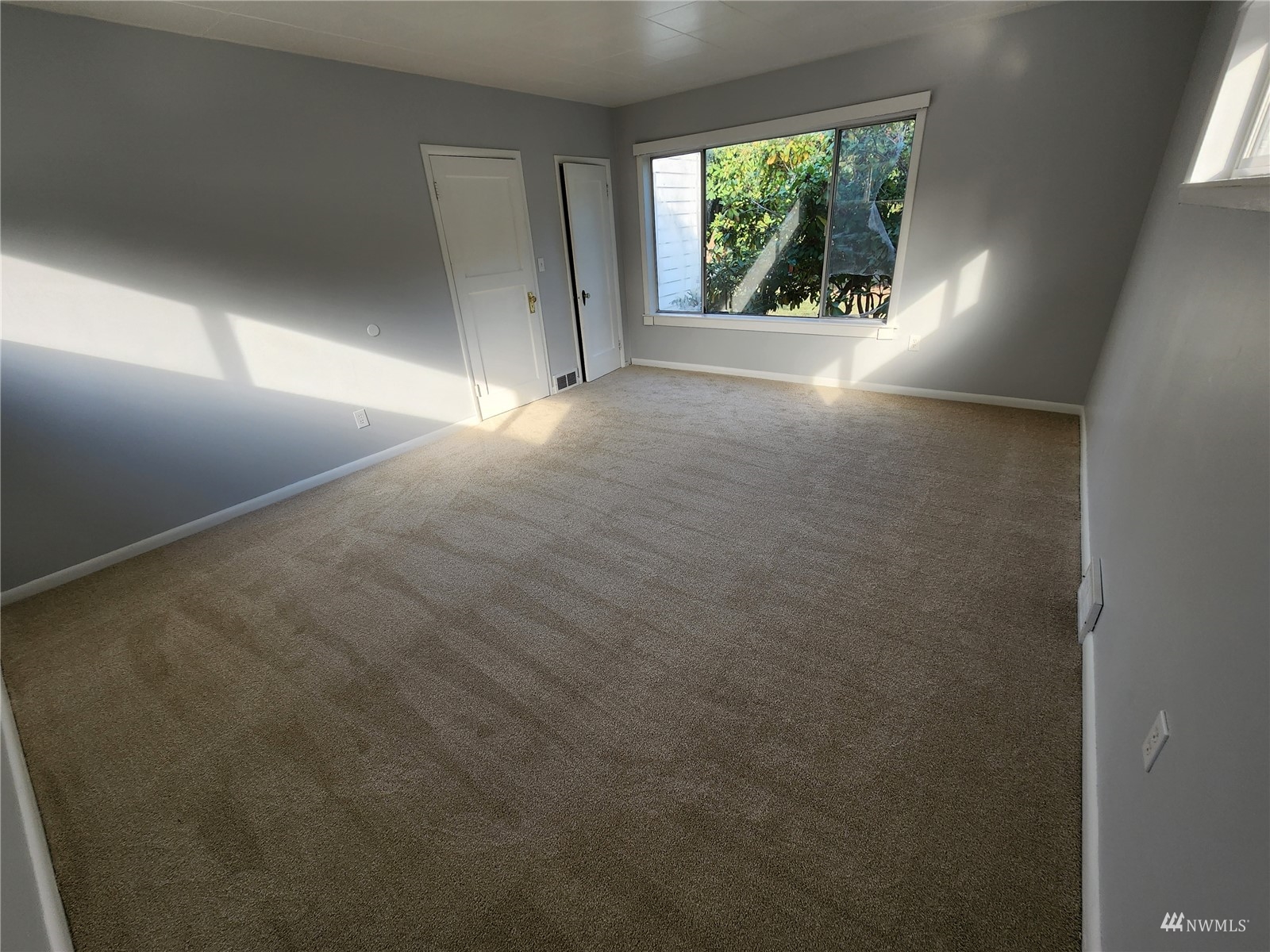 7426 Lower Ridge Road Everett, WA 98203 - Photo 16 of 28 an empty room with windows