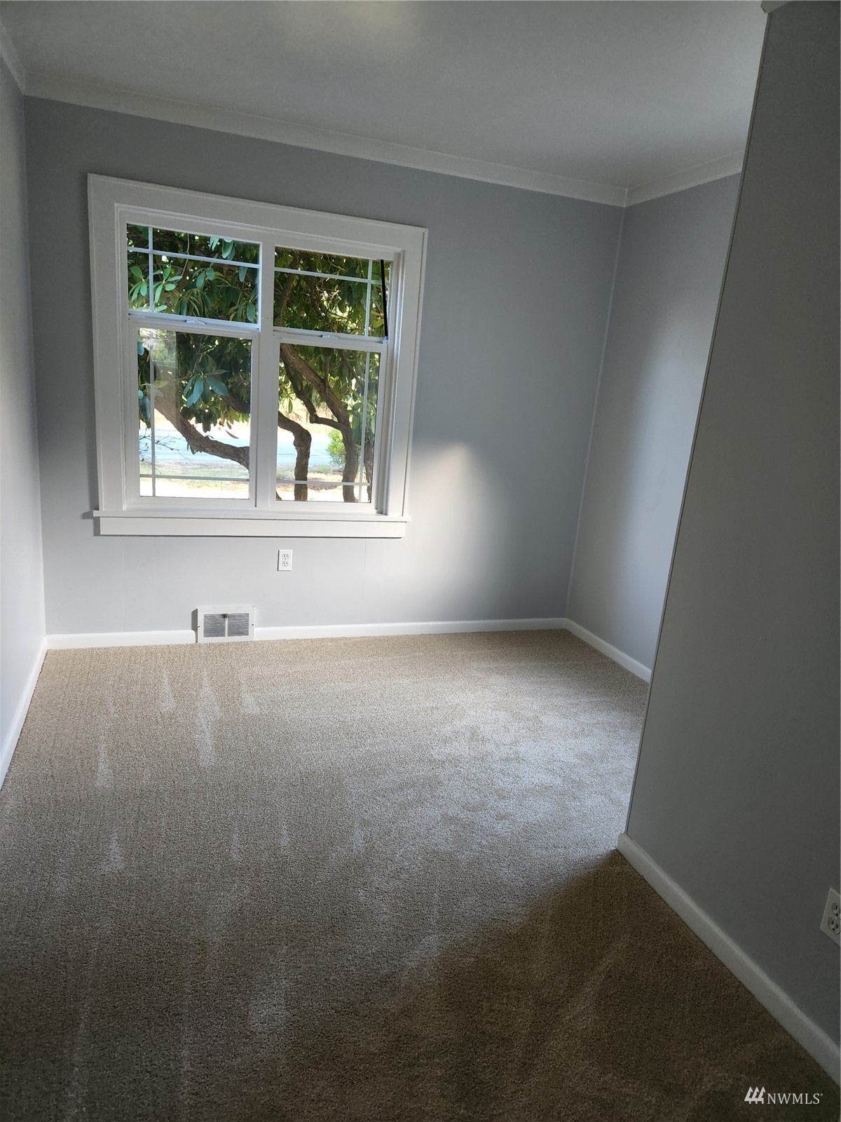7426 Lower Ridge Road Everett, WA 98203 - Photo 17 of 28 an empty room with a window