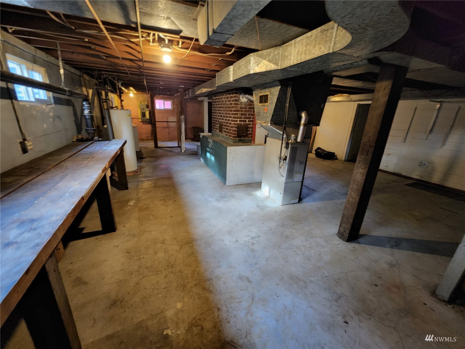 7426 Lower Ridge Road Everett, WA 98203 - Photo 24 of 28 a view of an empty room with wooden floor