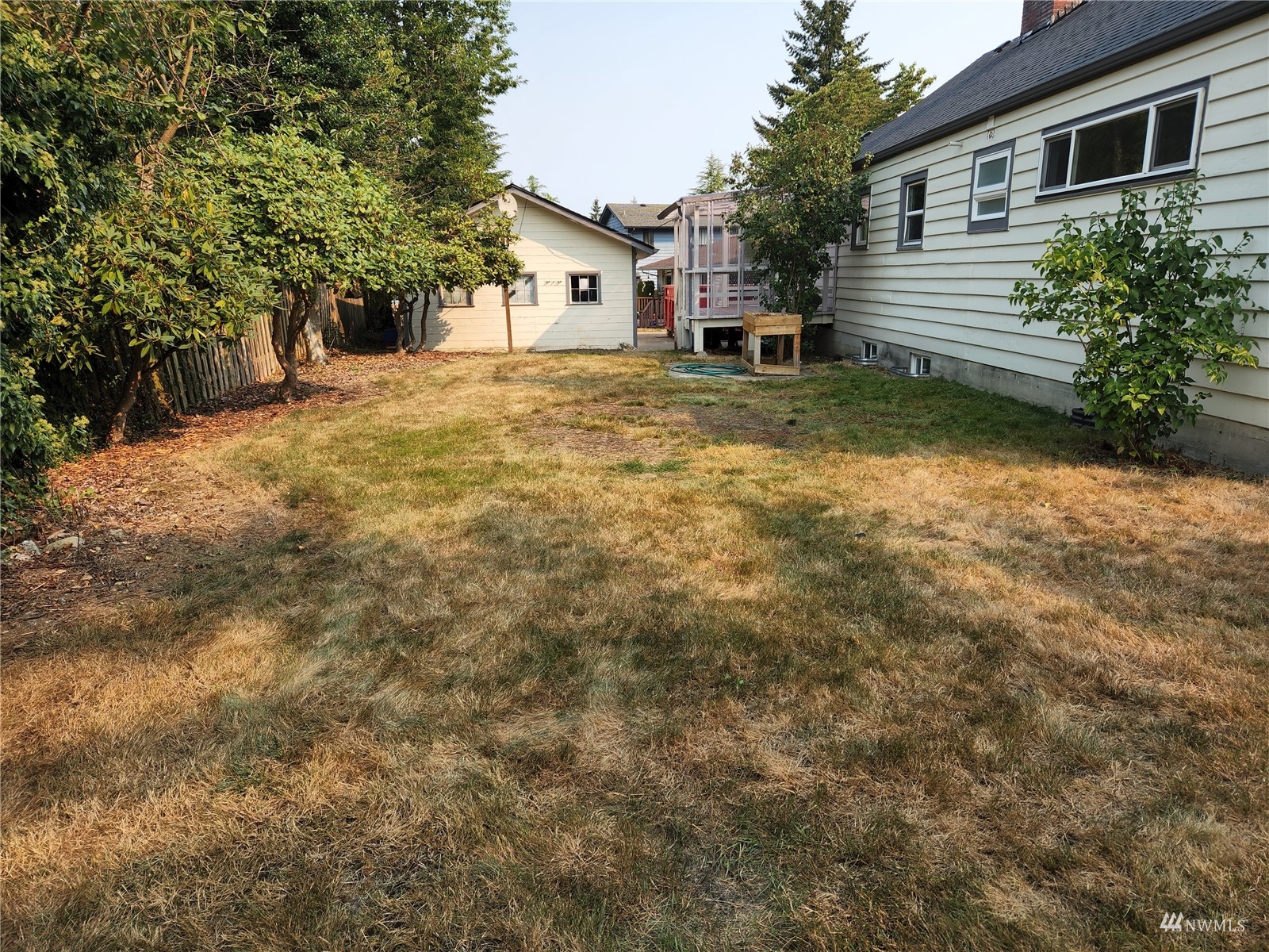 7426 Lower Ridge Road Everett, WA 98203 - Photo 25 of 28 a view of a house with a yard