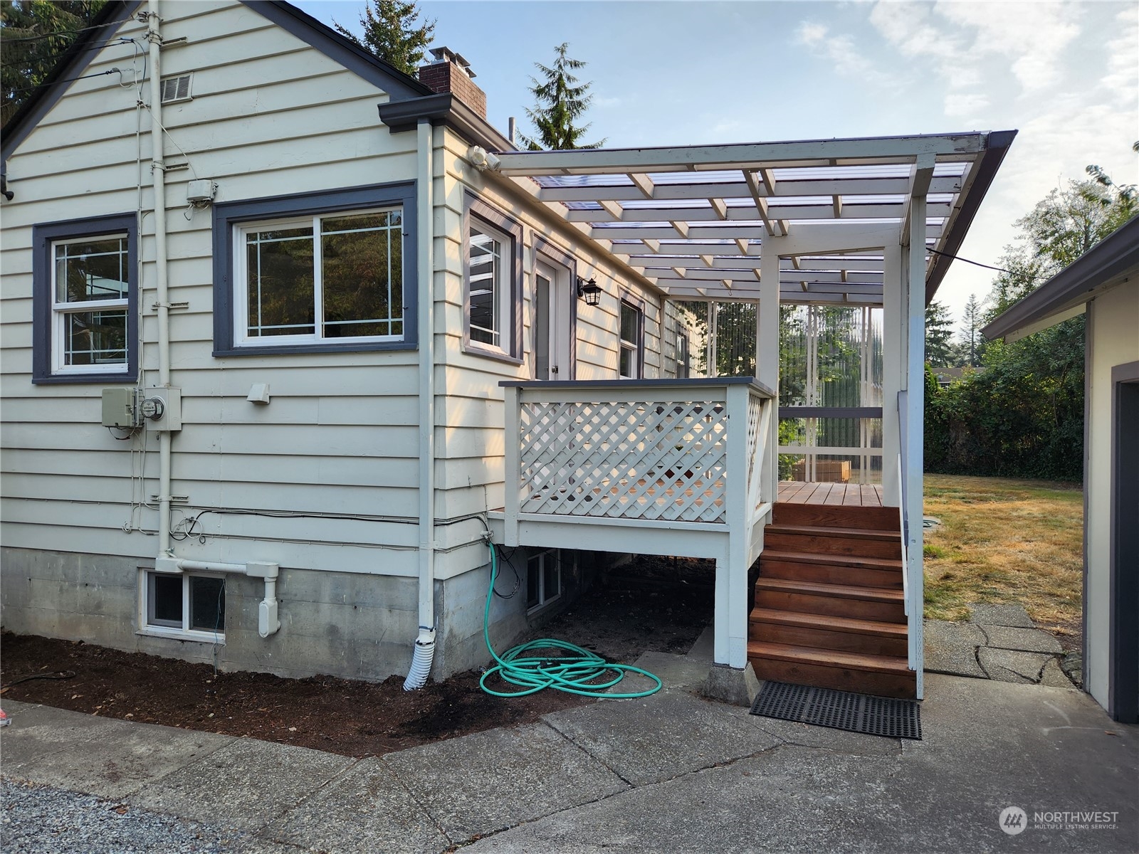 7426 Lower Ridge Road Everett, WA 98203 - Photo 28 of 28 a front view of a house with a yard
