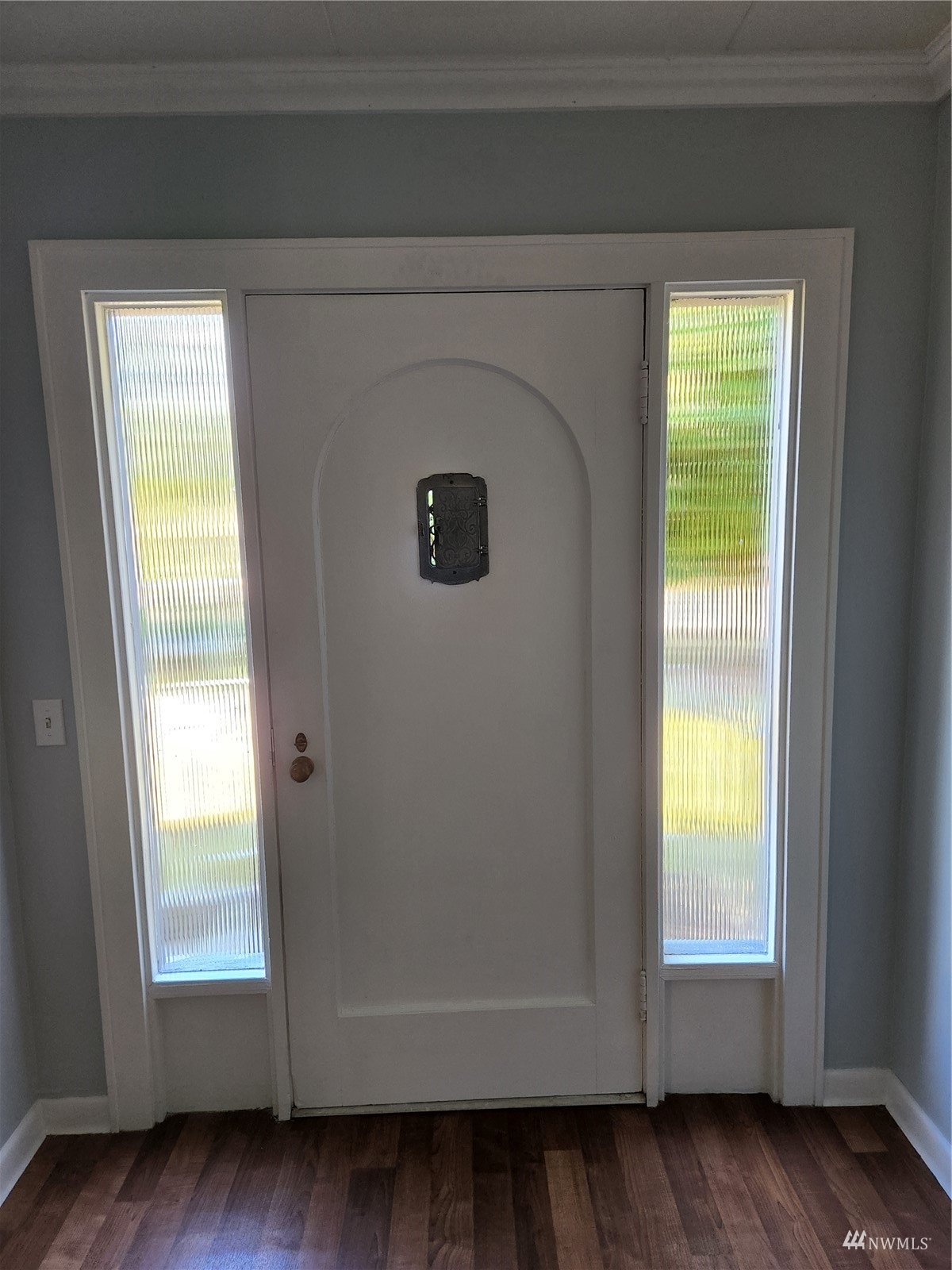 7426 Lower Ridge Road Everett, WA 98203 - Photo 7 of 28 a view of front door with wooden floor