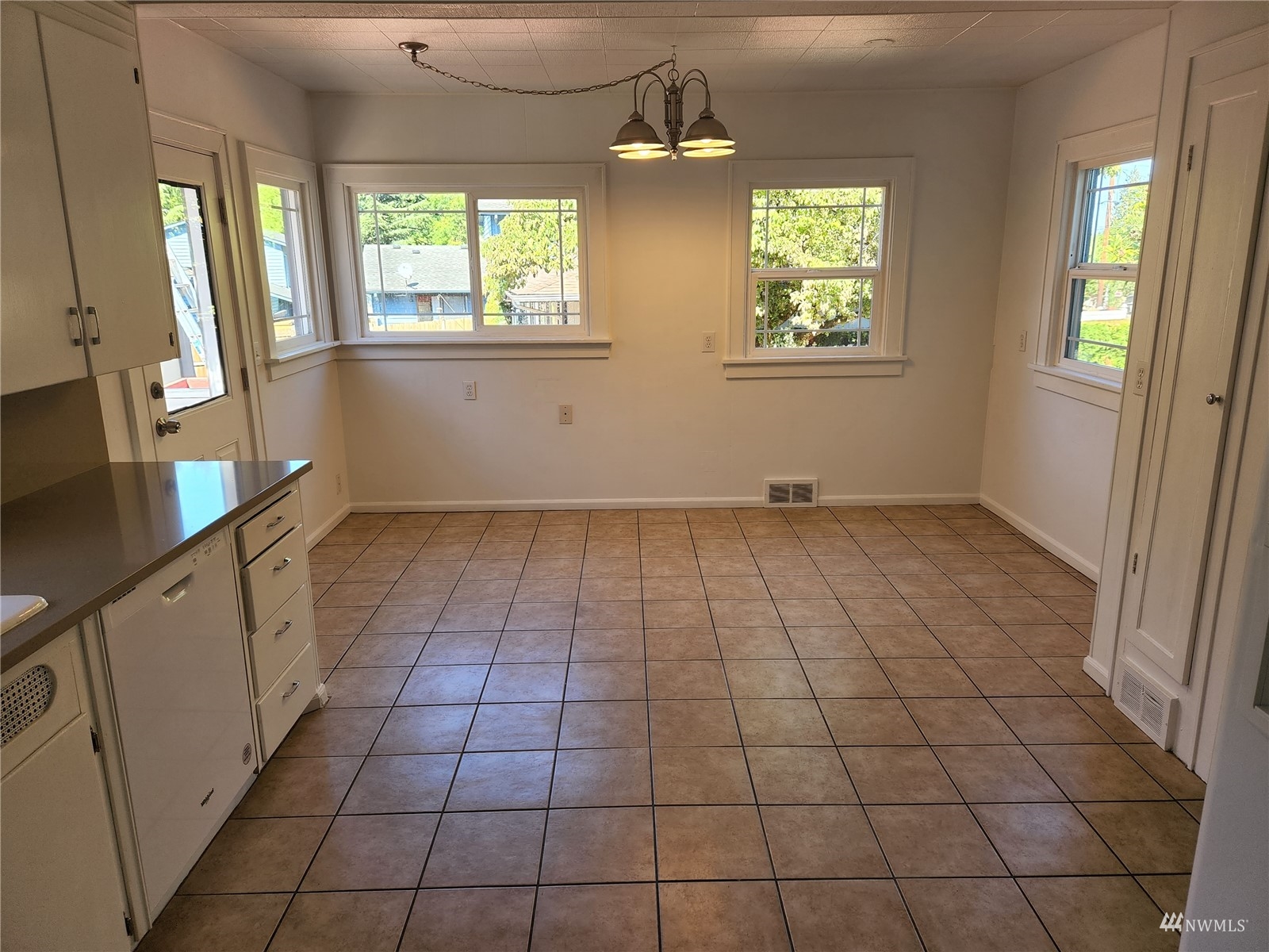 7426 Lower Ridge Road Everett, WA 98203 - Photo 9 of 28 an empty room with windows
