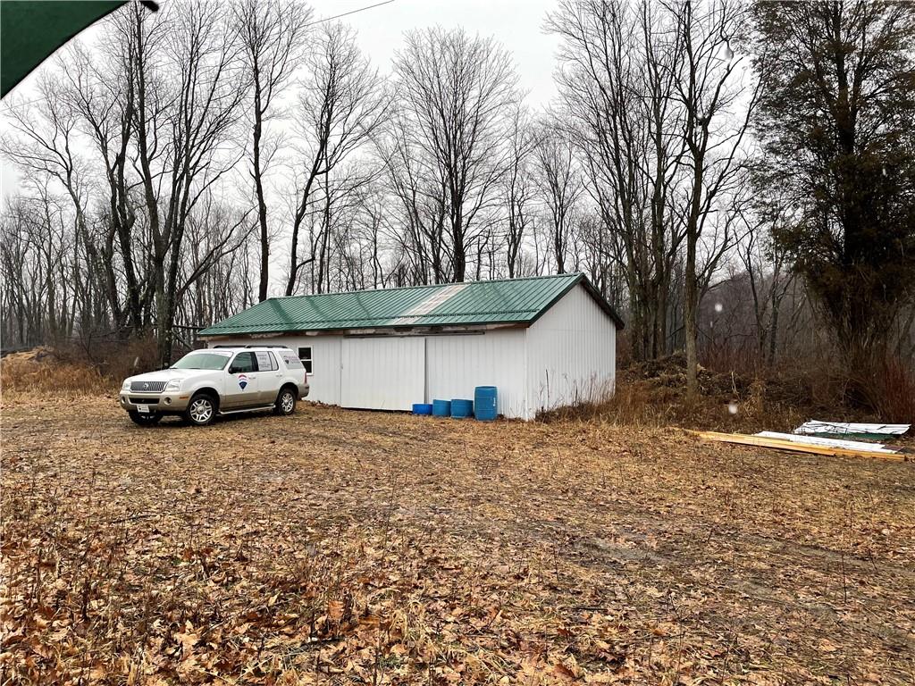 0 Craig & Henry Roads Marion Center, PA 15759 - Photo 6 of 12 a white house that has a tree in front of it