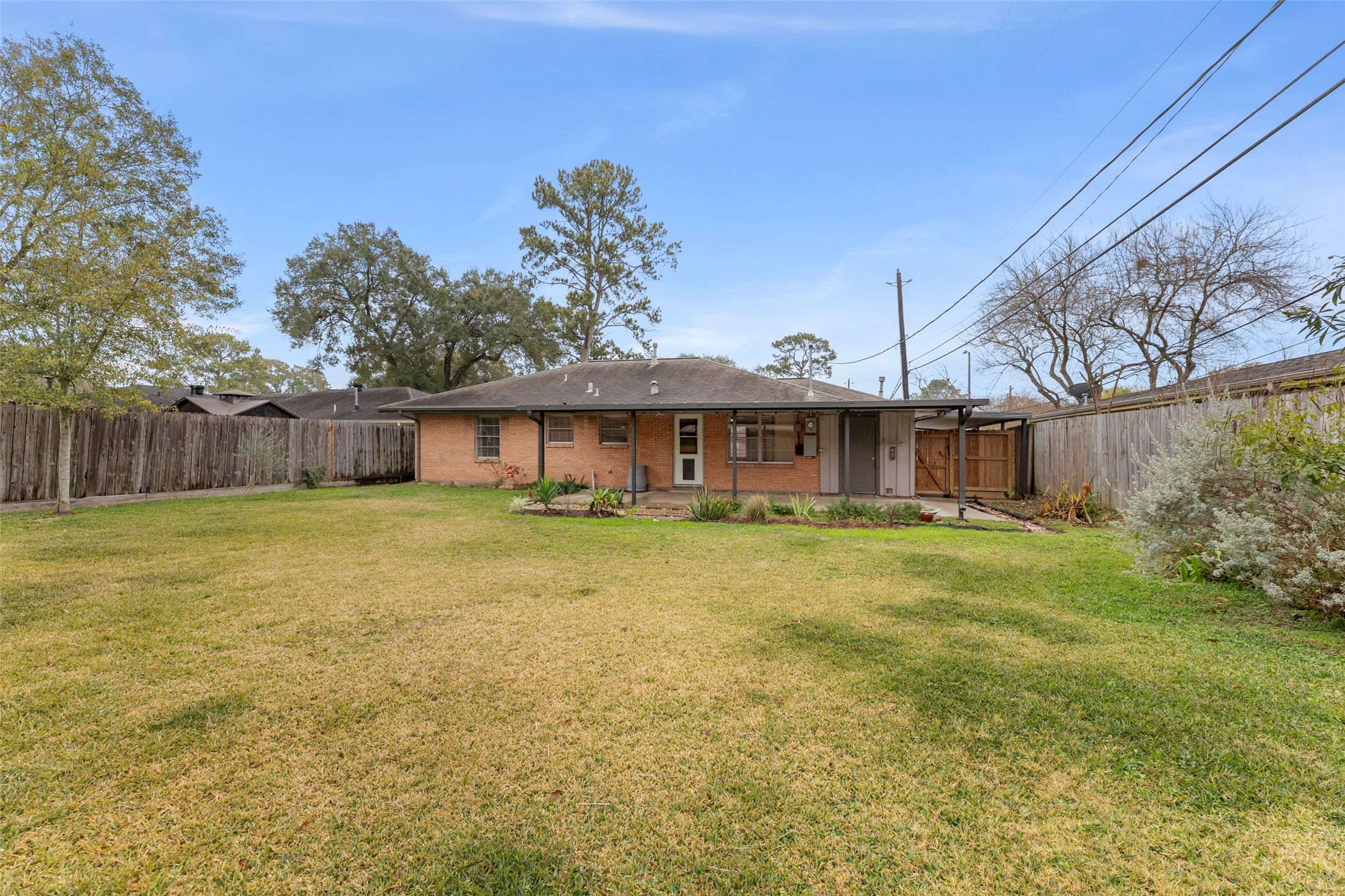 6148 Indigo Street Houston, TX 77074 - Photo 15 of 37 a front view of a house with a yard