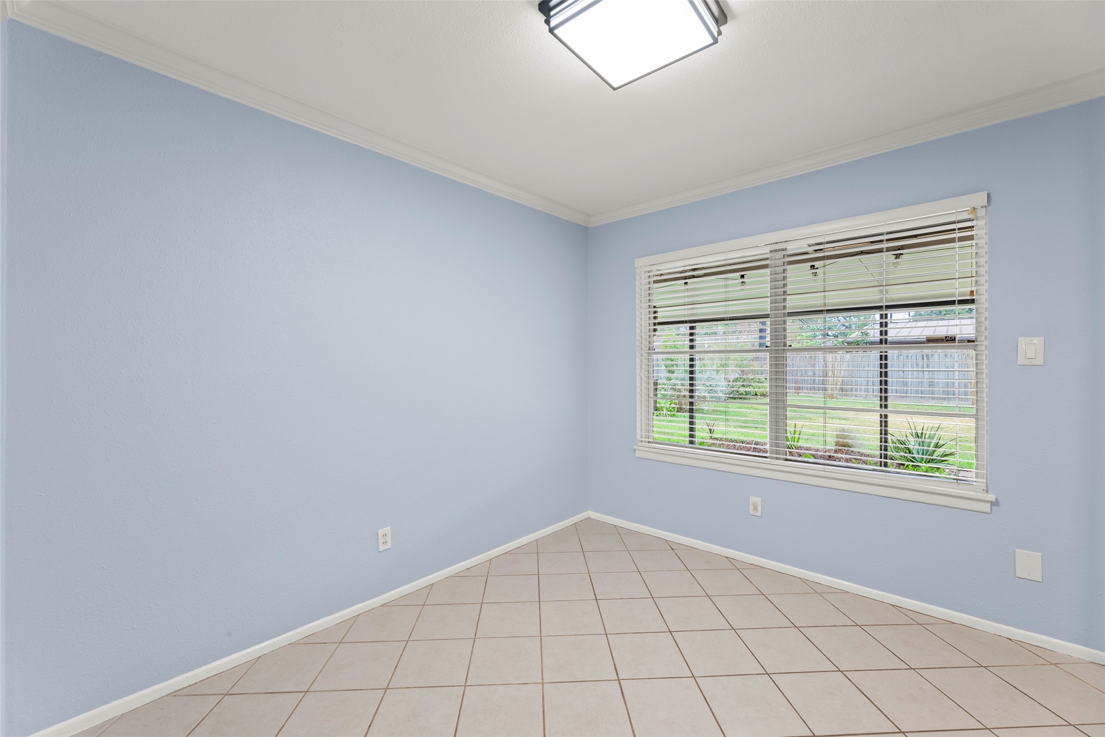 6148 Indigo Street Houston, TX 77074 - Photo 23 of 37 a view of an empty room with a window